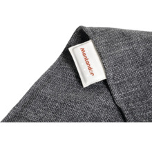 Detailopname van een grijze stof met Montandor logo