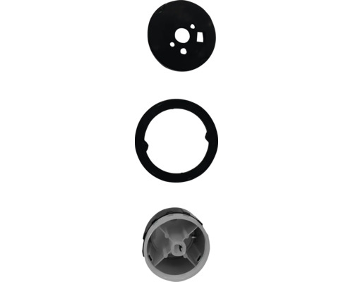 Detailopname van fornuis onderdelen: afdekking, pakking en bedieningsknop