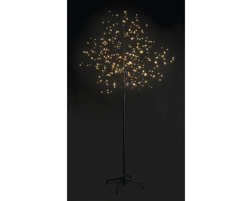 Decoratieve boom met veel LED-lampjes op een metalen voet