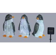 Drie pinguïnfiguren met zonnepaneel voor buiten
