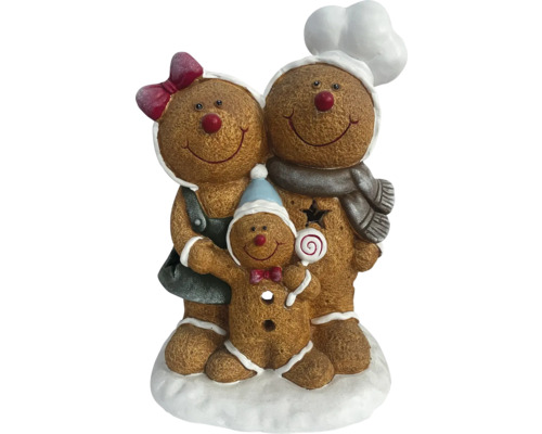 Decoratieve peperkoekfamilie als feestelijke kerstdecoratie