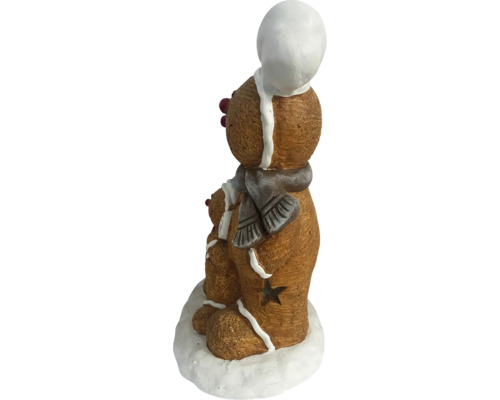 Decoratieve peperkoekfiguren met sjaal en muts