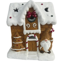 Decoratief peperkoekhuis met dwergfiguur voor de kerstperiode