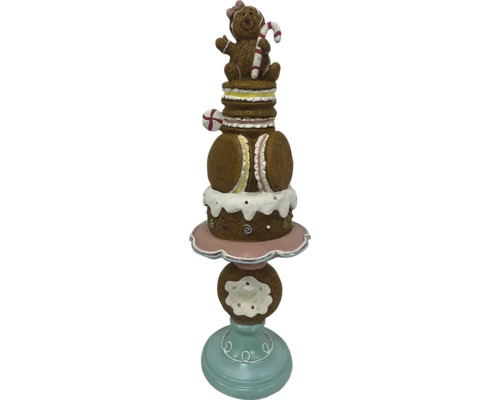 Decoratief snoepfiguur met peperkoekmannetje, macarons en donut