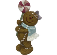 Peperkoekfiguur met lolly als kerstdecoratie
