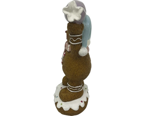 Peperkoekmannetjesfiguur met muts als kerstdecoratie