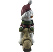 Decoratieve sneeuwpop op houten scooter voor binnenshuis