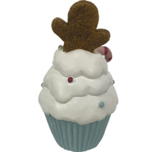 Decoratieve cupcake met peperkoekmannetje voor kerst