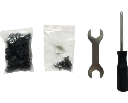 Twee zakken met schroeven, een moersleutel en een schroevendraaier