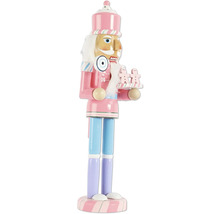 Decoratieve houten notenkrakerfiguur met zuurstokken, peperkoekmannetjes en snoepjes