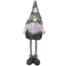 Kerstkabouter met lange baard en gestreepte benen