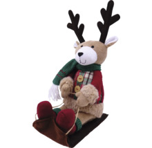 Decoratief rendierfiguur op slee met sjaal en jas