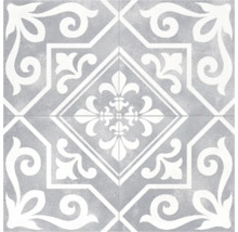 Decoratieve grijze tegels met wit bloemmotief
