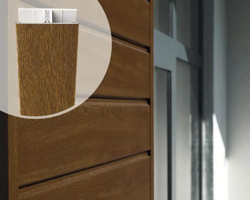 ESCADE Afwerkprofiel koppel aluminium/pvc golden oak, 17-50mm 3000mm Close-up van een houten paneel met messing en groef