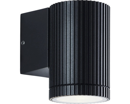 Zwarte wandlamp met geribbeld oppervlak.