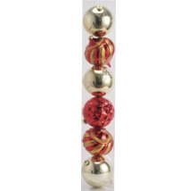 Kerstballen van verschillende vorm in een transparante buis