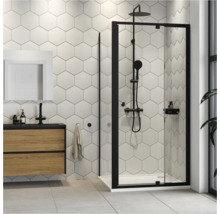 Moderne badkamer met douchecabine, wastafel en zeshoekige wandtegels.