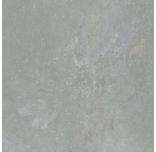 Close-up van een grijs betonnen oppervlak met onregelmatige textuur