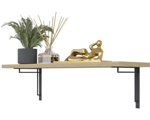 Wandplank met plant, geurstokjes en goudkleurig beeld