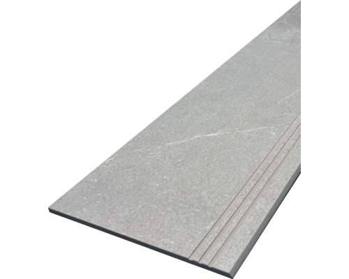 Grijze keramische trap met groeven