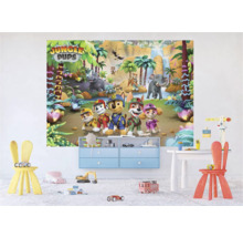 Kinderkamer met Jungle Pups muurschildering, speelgoed en meubels.