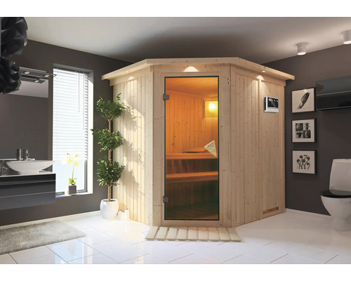 Hoeksauna in badkamer met wastafel, toilet en decoratie