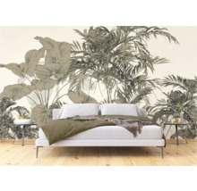 Slaapkamer met fotobehang met tropische plantenmotieven achter een bed