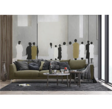 Moderne woonkamer met bank, salontafels en decoratieve wanddecoratie