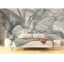 Slaapkamer met fotobehang met bloemmotief, bed en nachtkastjes