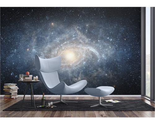Woonkamer met fauteuil en galaxy fotobehang