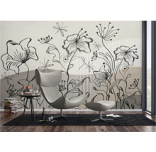 Woonkamer met fotobehang met bloemmotief, fauteuil en bijzettafel