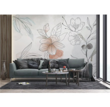 Woonkamer met bank, salontafels en bloemenbehang voor een moderne woonomgeving