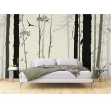 Slaapkamer met een fotobehang met bosmotief en vogel