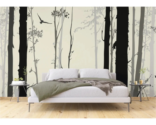 Slaapkamer met een fotobehang met bosmotief en vogel