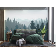 Slaapkamer met bosbehang, bed en nachtkastje