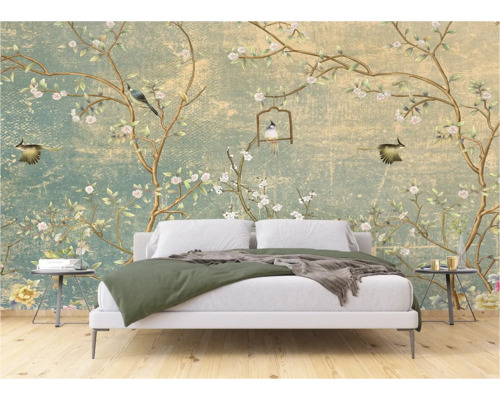 Slaapkamer met fotobehang met vogel- en bloemmotief