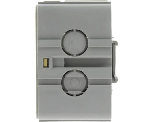 Grijs apparaatinzetstuk met twee ronde openingen.