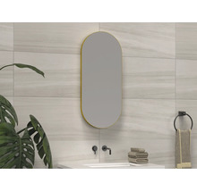 Moderne badkamer met ovale spiegel en wandkraan