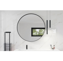 Moderne badkamer met ronde spiegel, wastafel en handdoekhouder