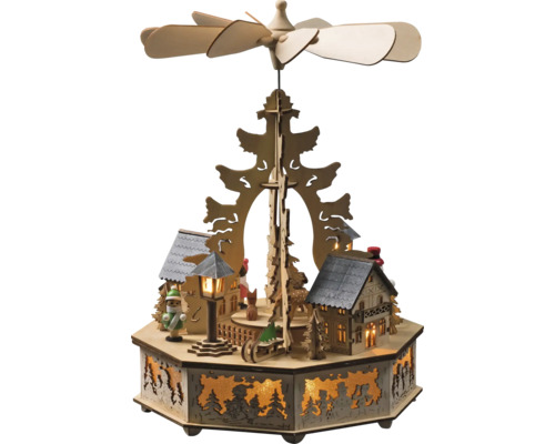 Houten kerstpiramide met winterdorpsscène en draaiende wieken