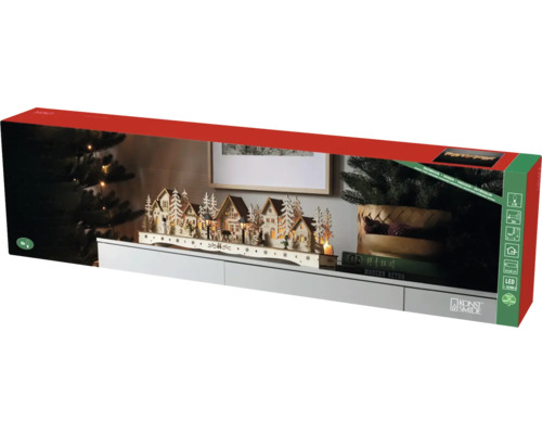 Verpakking van een verlichte winterdorpdecoratie van Konstsmide voor binnenshuis