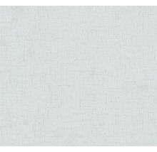 Close-up van een lichtkleurig textielbehang met een fijne structuur