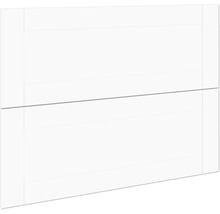 Detailopname van een wit meubelfront met handgreep