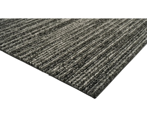 Detailopname van een rechthoekig tapijt met geribbeld oppervlak