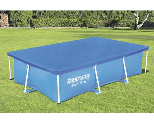 Rechthoekig zwembad met afdekking op een gazon