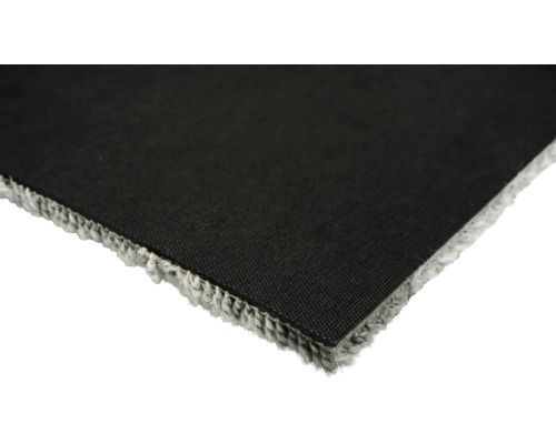 Detailweergave van een tapijt met textiele rug en franjes