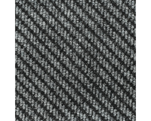 Detailopname van een tapijt met een gemustered ontwerp