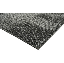 Close-up van een grijs tapijt.