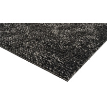 Close-up van een grijs tapijt.