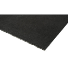 Close-up van een stuk zwart kunstgras.